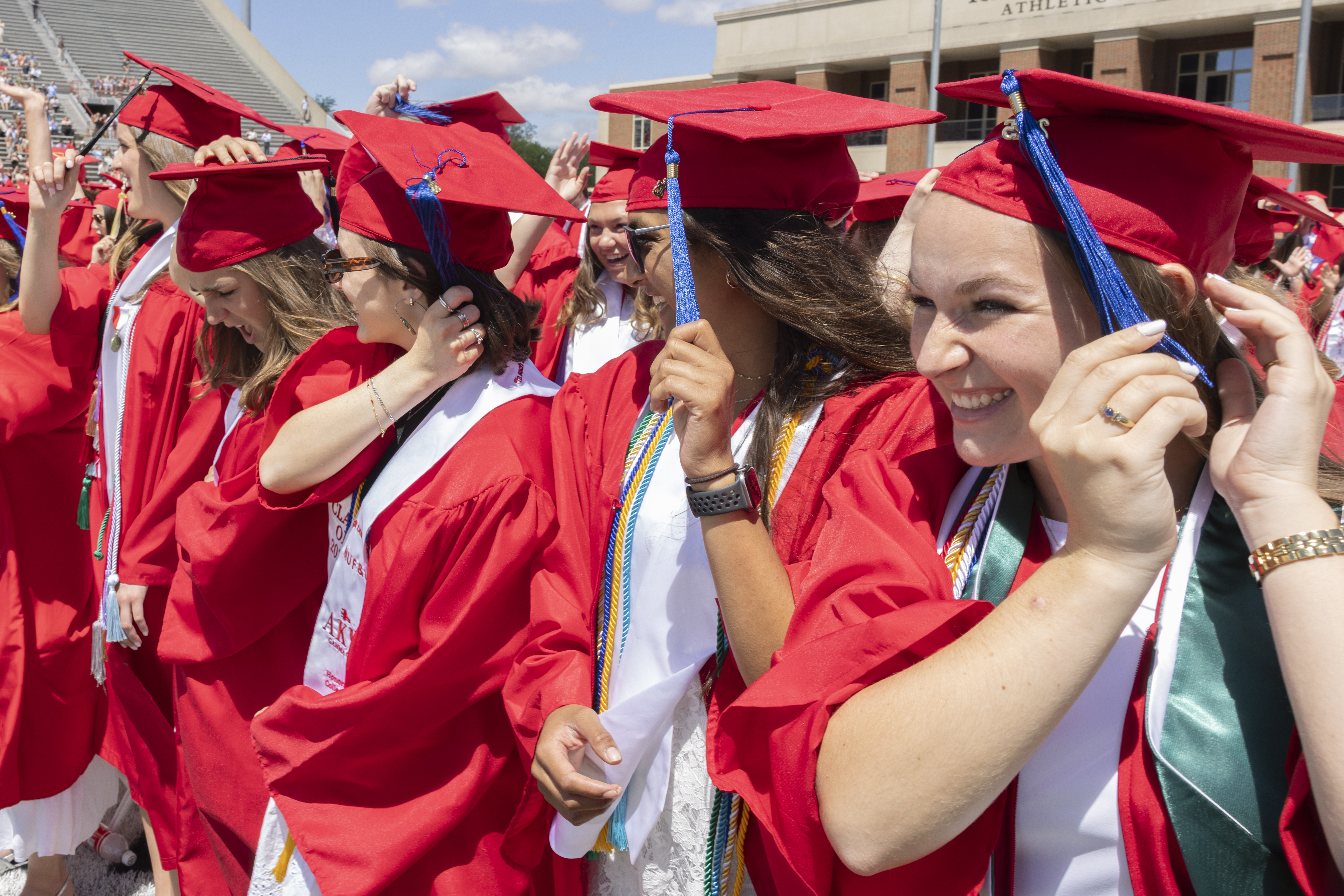 Miami University students turn their tassels during spring commencement.