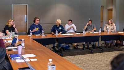 Students Sylvia Hanson (far left) and Owen James (second from left) provide first-hand accounts of their experience on campus during the storm.