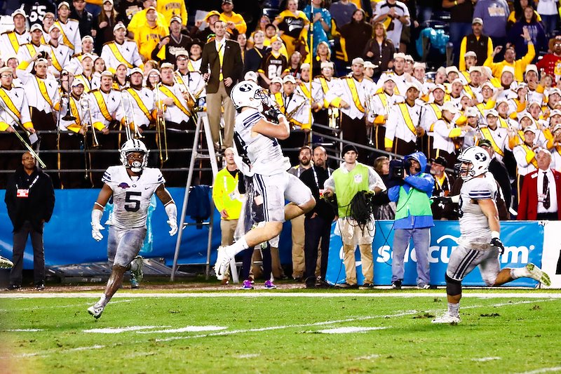 Kai Nacua makes an interception in the final minute of the game to seal the win over Wyoming - Photo by Jaren Wilkey/BYU