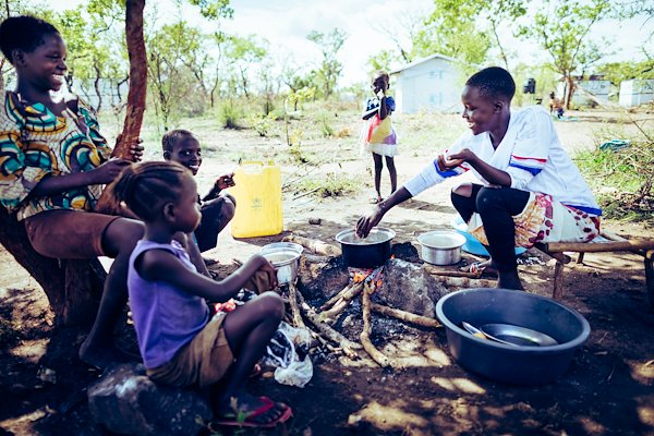 Families often make cornmeal biscuits and sell them at the market in order to make extra money.