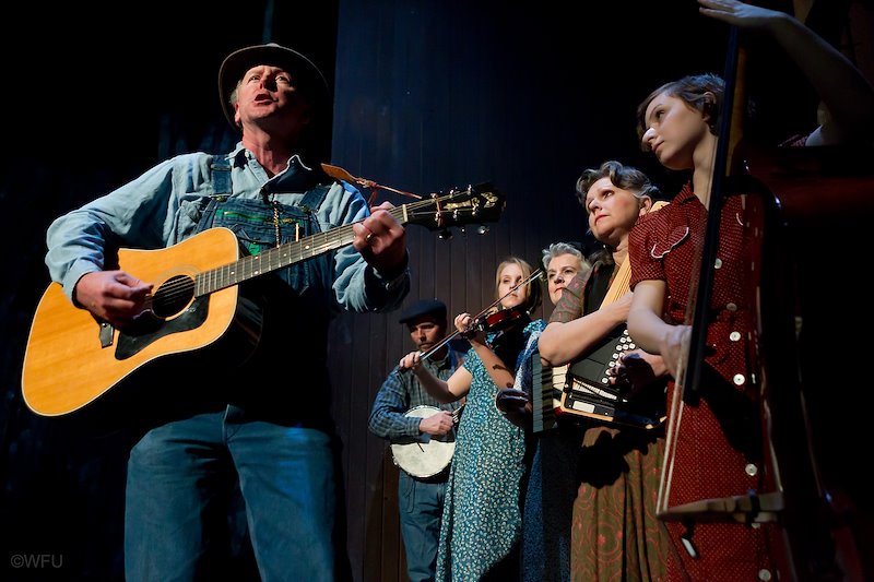 Bill McIlwain (MAEd '94) leads an old-time string band of  Wake Foresters to accompany the production.