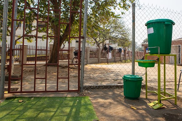 At every entry gate, there is a cleaning area. This big bucket is filled with chlorine water to disinfect people that enter the CURE premises.