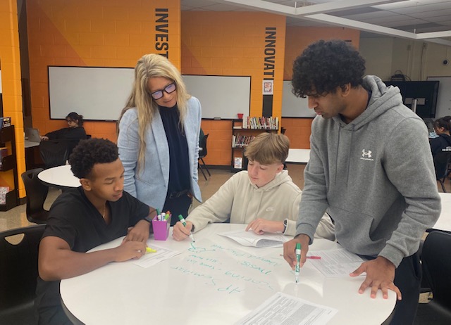 Principal Anderson with students