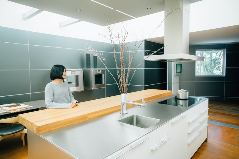 Eza strikes a pose in this dreamy Bulthaup kitchen. She seems to fit right in with the aesthetic.