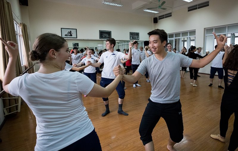 Carissa Moser and her partner dance during the workshop at the Hanoi Academy of Theatre &amp; Cinema. Photo by Jaren Wilkey/BYU
