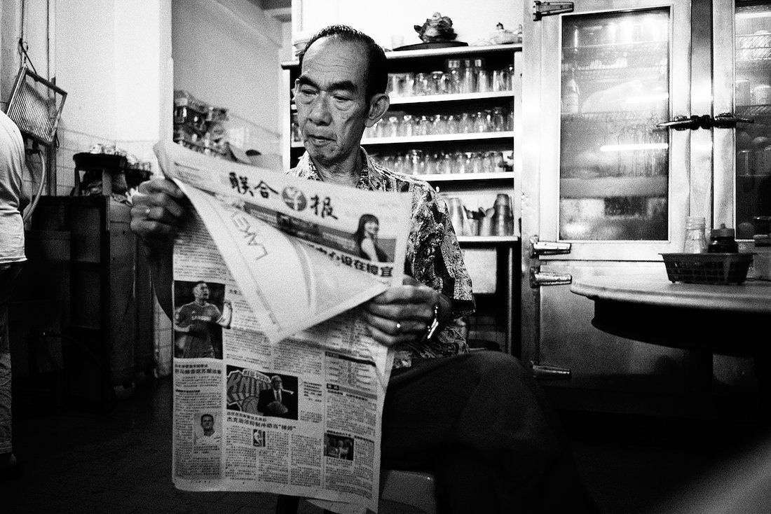 we never exchanged a word but he is always there every saturday, reading the chinese morning newspapers.