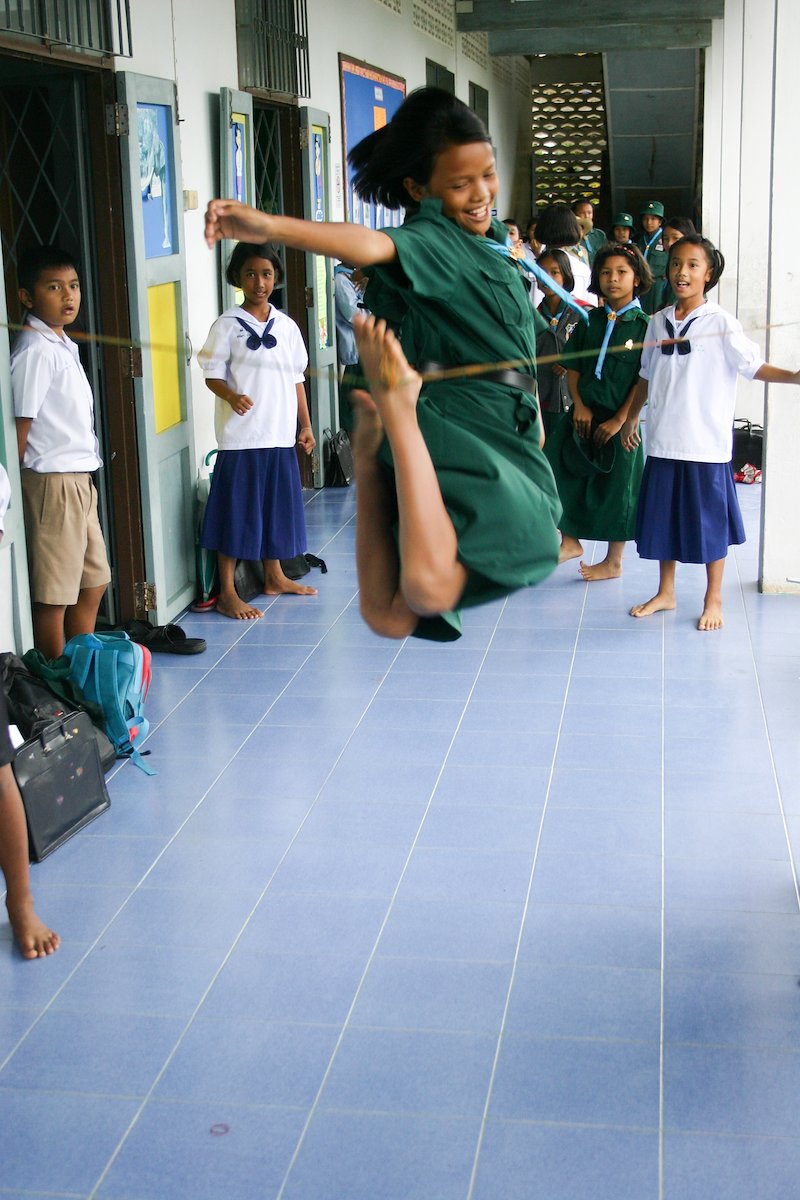 The most popular game amongst girls at my school was a sort of reverse limbo where they tried to jump over a large rubberband.