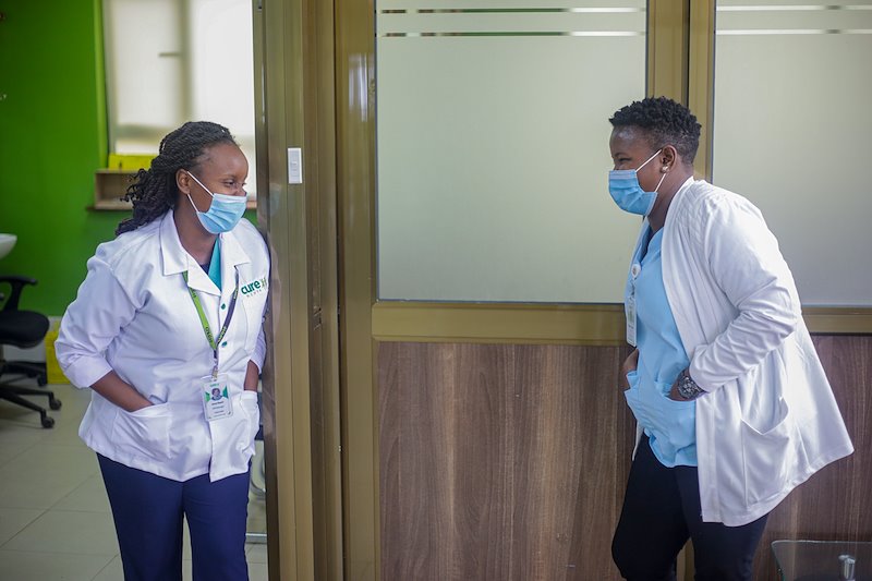 Lunch break jokes between OPD Nurse Grace (left) and Private Ward Nurse Pauline (right).