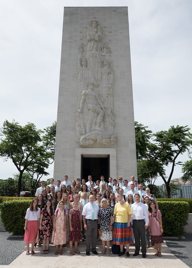 The BYU Chamber Orchestra poses for a group photo at the Memorial in the American Cemetery in Manila. Photo by Jaren Wilkey/BYU