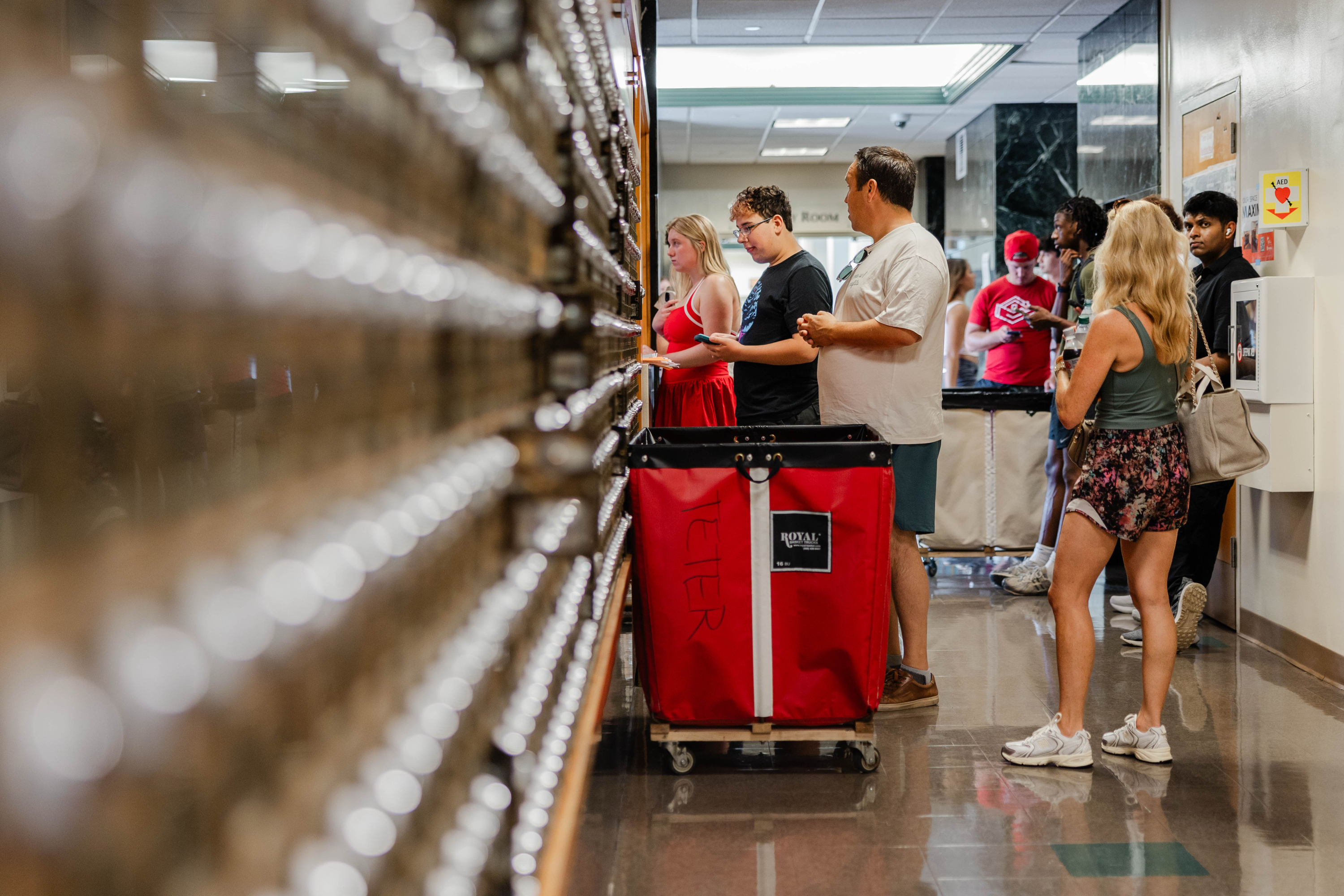 Students pick up packages at the Wright Quad central desk during IU ...