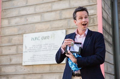 Dr. Rick is surprised with a gift during his goodbye party at CURE Ethiopia.