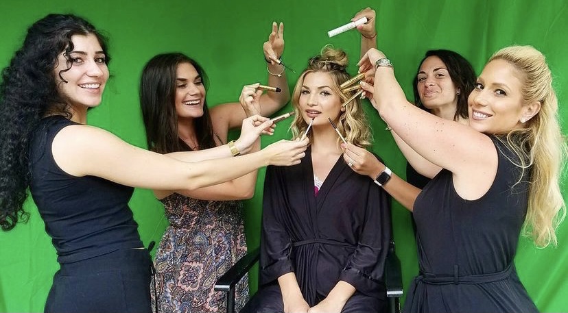 Chelsea Merola, left, and Lisa Trombetta, second from left, help out ...