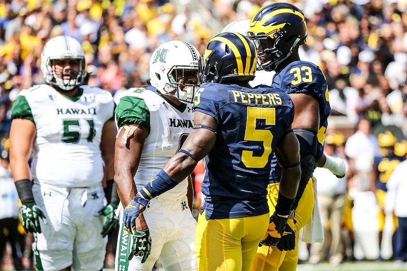 A brave Hawaii player talks trash to Jabrill Peppers.