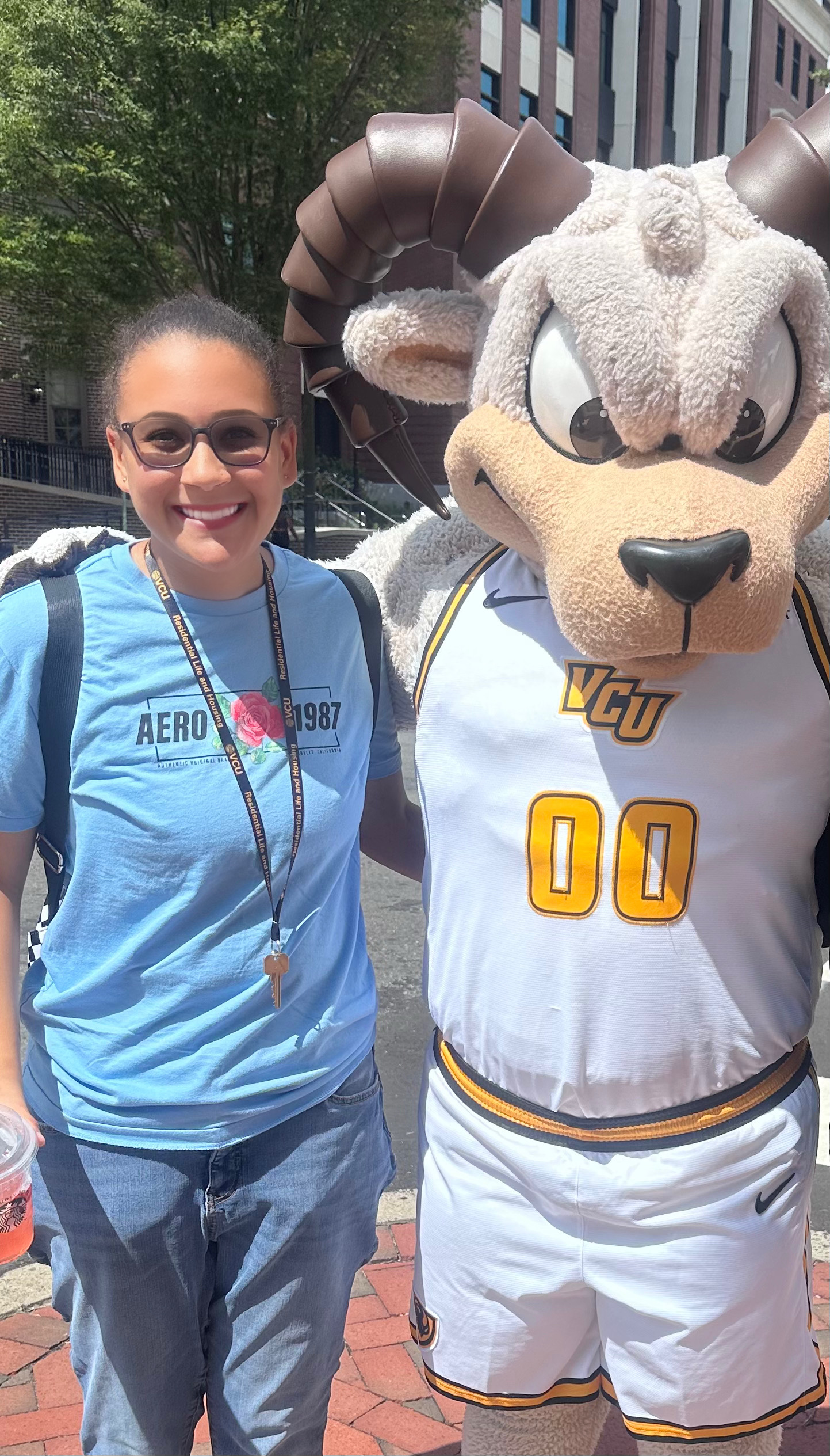 Ashlynn Crockett poses with VCU mascot Rodney the Ram.