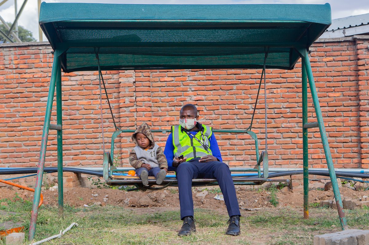 Spending time outside on the swing with our security officer.