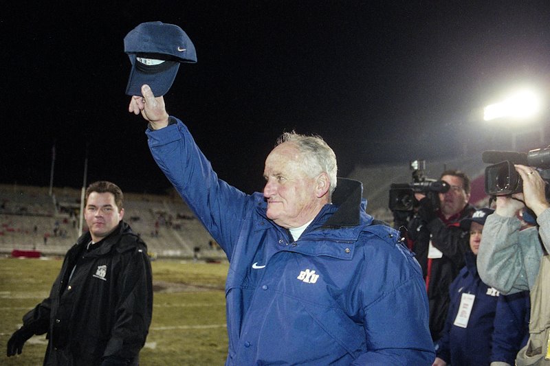 LaVell waves to the BYU fan section for the last time after defeating Utah in 2000.