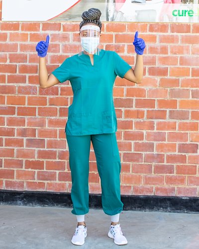 Physiotherapist Roxanne is all set with PPE gear and keeping safe.