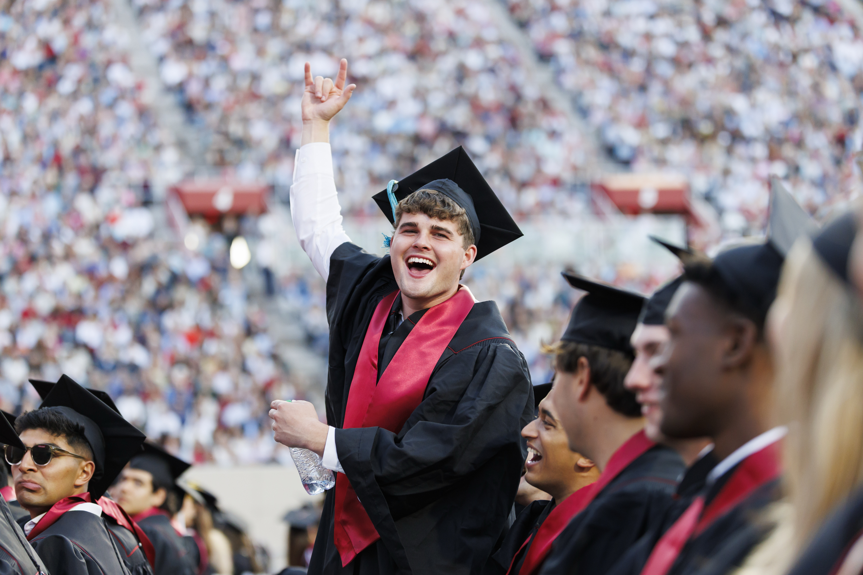 A graduate celebrates during the IU Bloomington Undergraduate ...