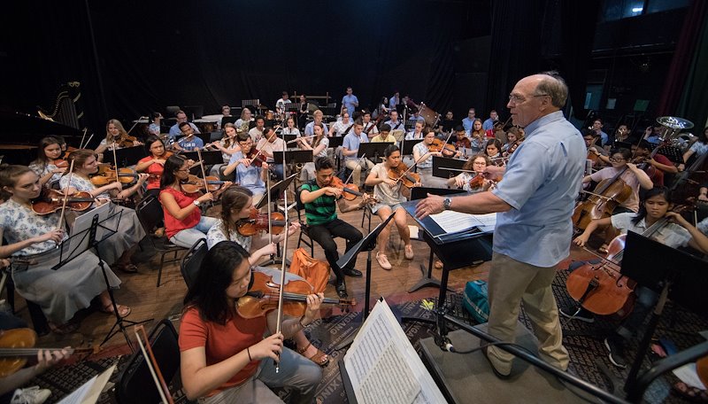 BYU's Kory Katseanes directs the combined orchestras during rehearsal at UP Diliman. Photo by Jaren Wilkey/BYU