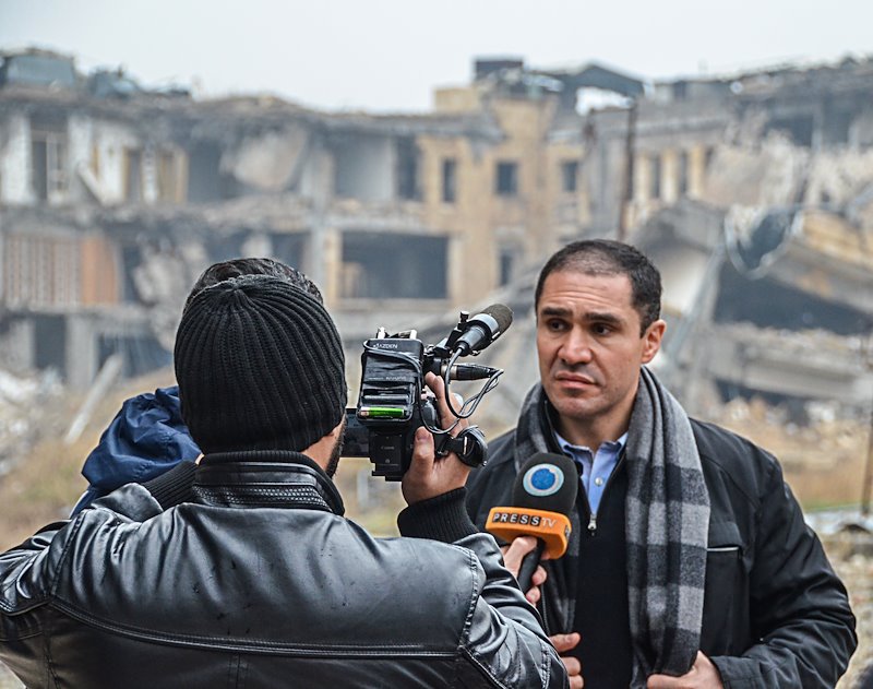 Fares al-Shehabi interviewed at the square where the Aleppo Chamber of Commerce used to be
