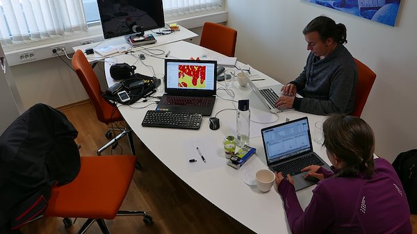 Marthe Larsen Haarr (SALT), Joan Fabres and Levi Westerveld (GRID-Arendal) working on the GIS model. Photo by Levi Westerveld.