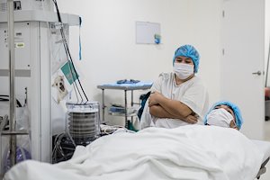 Sally waits in anticipation with his son, Alexander Jr., before the medical team works on Alexander's palate.
