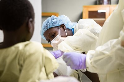 Haoua checks-up on Chafiou’s surgery wound - he’s almost healed enough to go home!