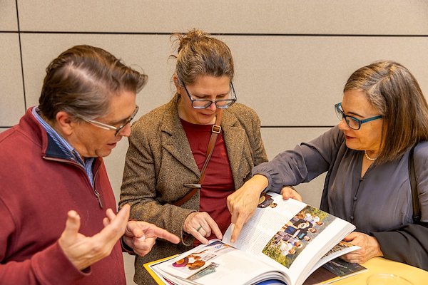 History professors Bill Carrigan and Emily Blanck recognized colleagues and former students in the later chapters as they chatted with Lee Talley, dean of Martinson Honors College.