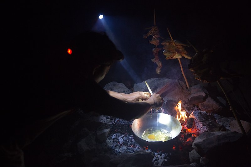 The first time I've seen an egg fried over a campfire.