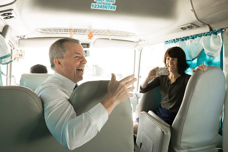 Dr. Jim Nelson tell a mission story to the students during a bus ride after attending church in Navarrete. Photo by Jaren Wilkey/BYU