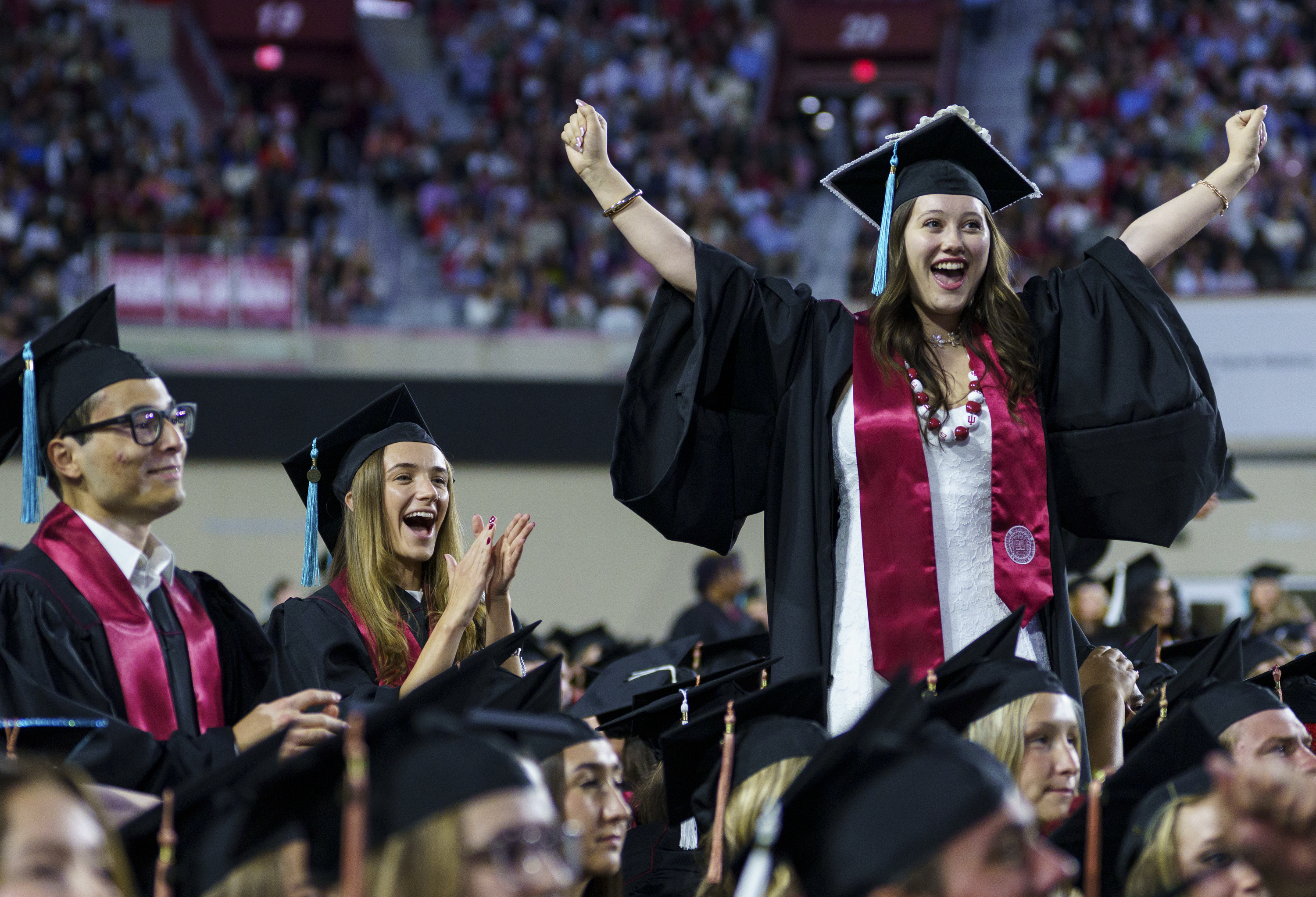 Joyous grads celebrate during the IU Bloomington Undergraduate ...