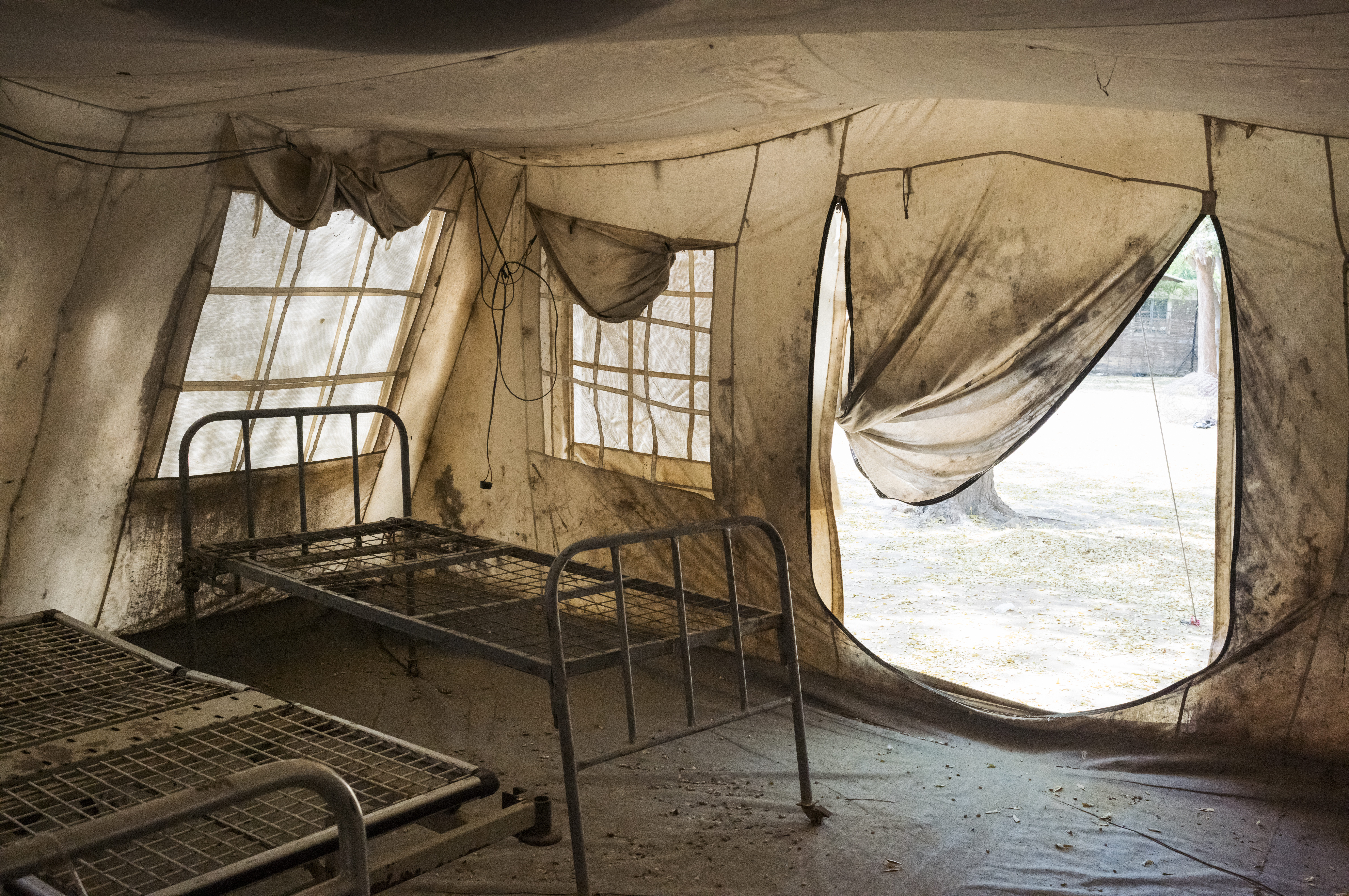 Inside the compound of the Mother Teresa Hospital, an empty canvas tent ...