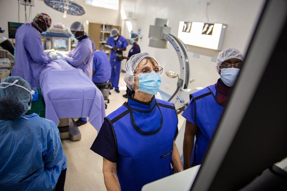 Radiographer Wendy and Kuda get ready to provide x-ray imaging during a surgery.