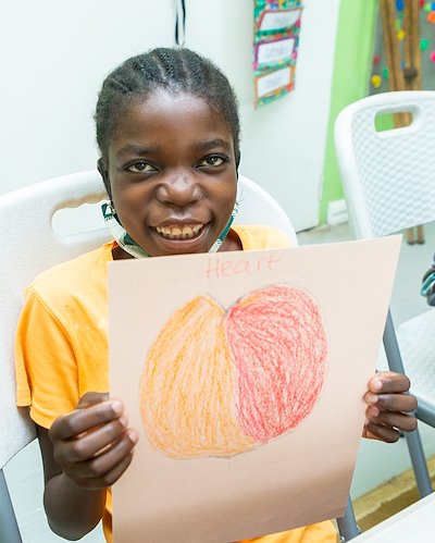 An orange and red heart to match her shirt!