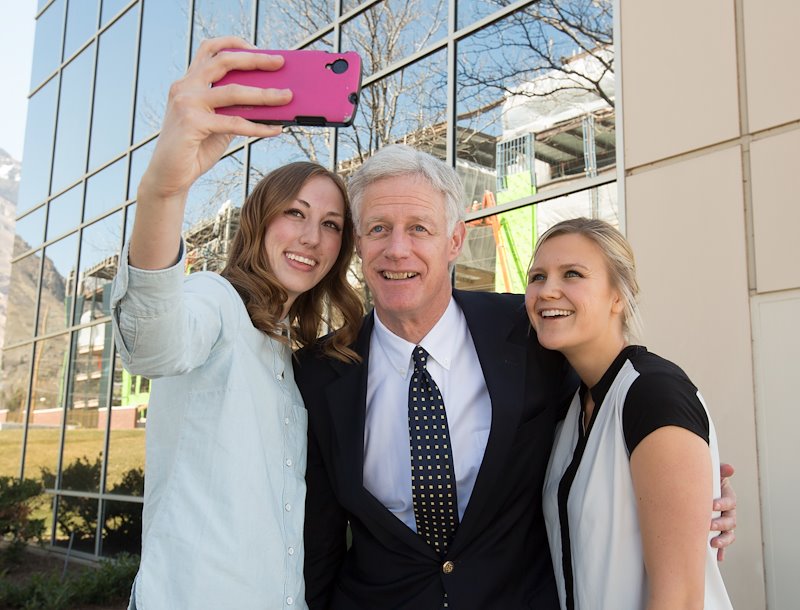 President Kevin Worthen helps deliver Meals on Wheels with BYU students Stacie Fleischer and Eliza Kamalu - Photo by Mark A. Philbrick/BYU