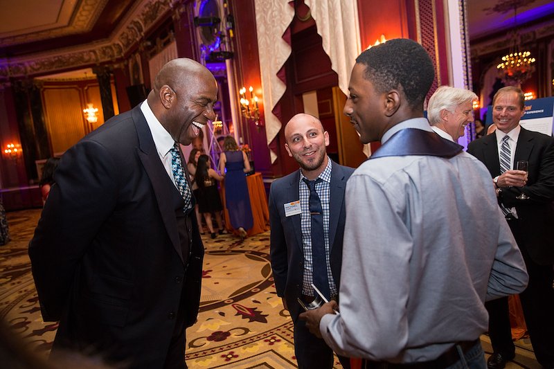 Earvin "Magic" Johnson always enjoys getting to know OneGoal students and their program leaders.