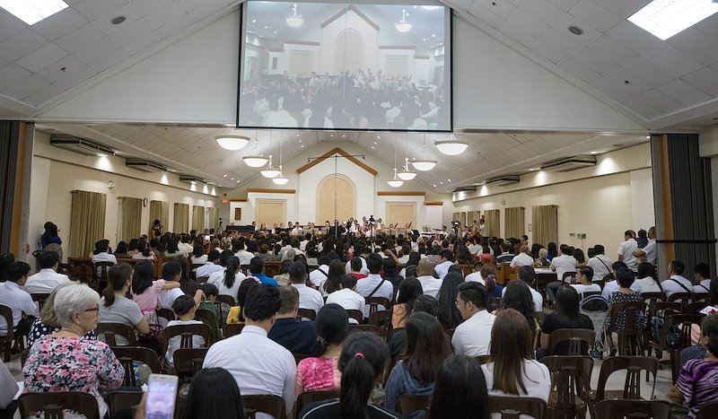 The BYU Chamber Orchestra hosts a fireside at the Aurora Chapel in Quezon City. Photo by Jaren Wilkey/BYU