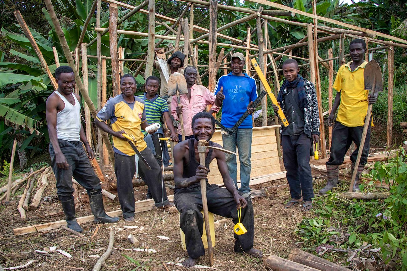Katembo is building a house for his family together with nine other displaced men.