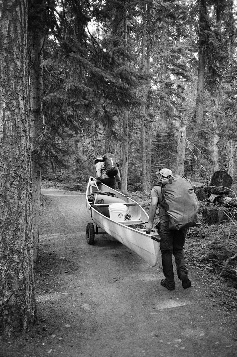 Dragging the canoe through the woods