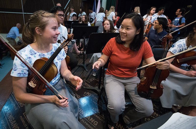 Maren Vernon interacts with a student from UP Diliman at rehearsal. Photo by Jaren Wilkey/BYU