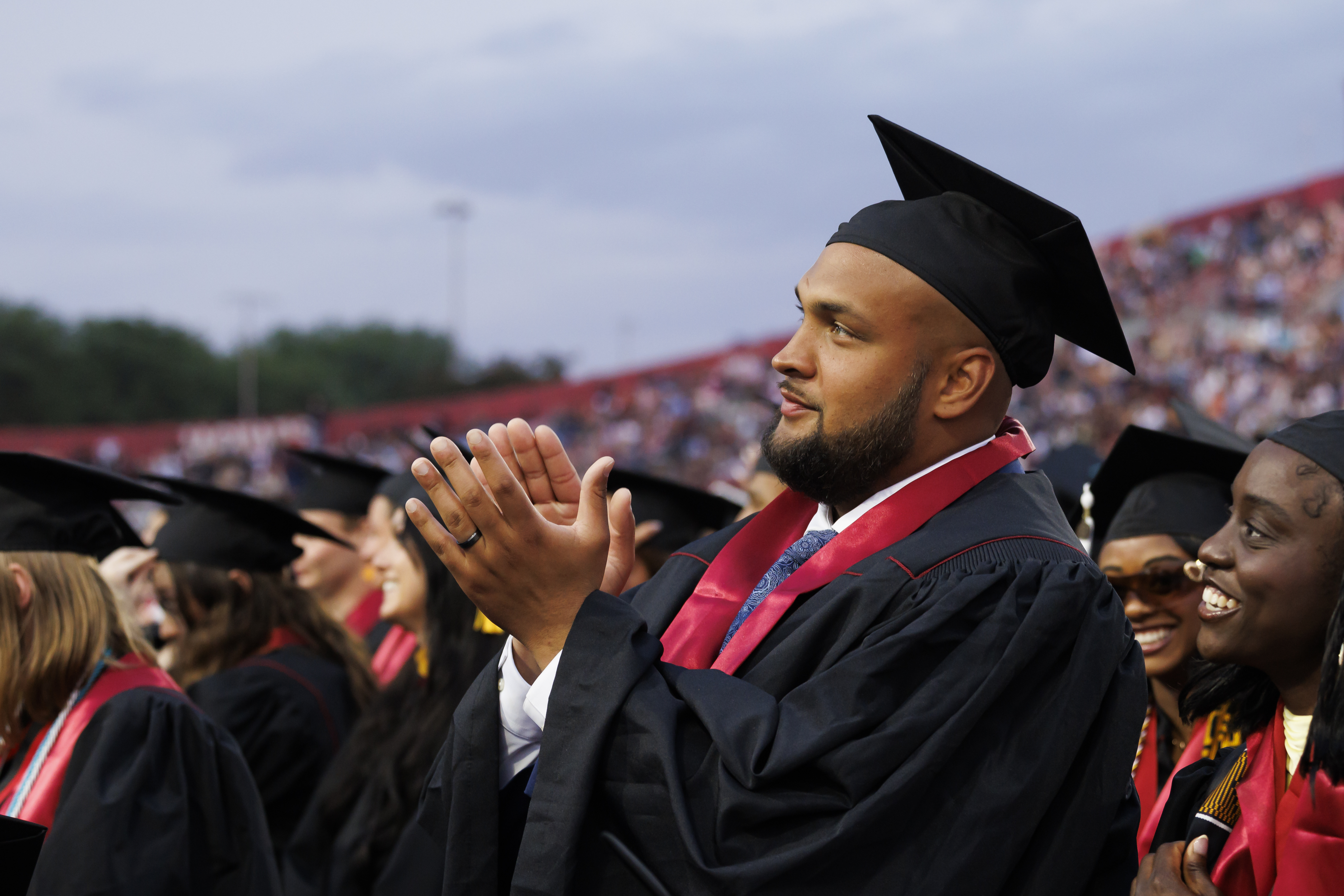 A graduate stands for recognition during the IU Indianapolis ...