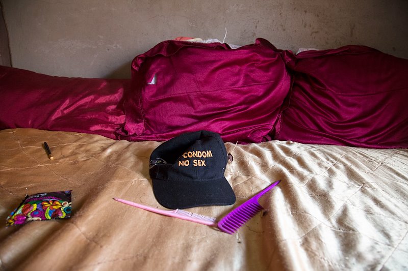 No condom, no sex” is written on a hat belonging to Memory, a sex worker in Chipadze, Bindura, Zimbabwe.