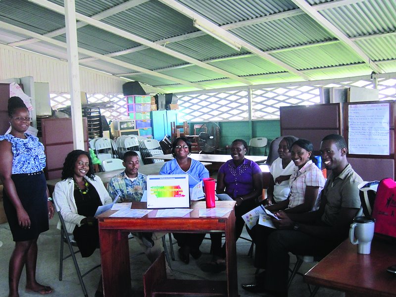 Young social workers implement management dashboards to improve service delivery in Guyana. (Photo: MSH Staff)
