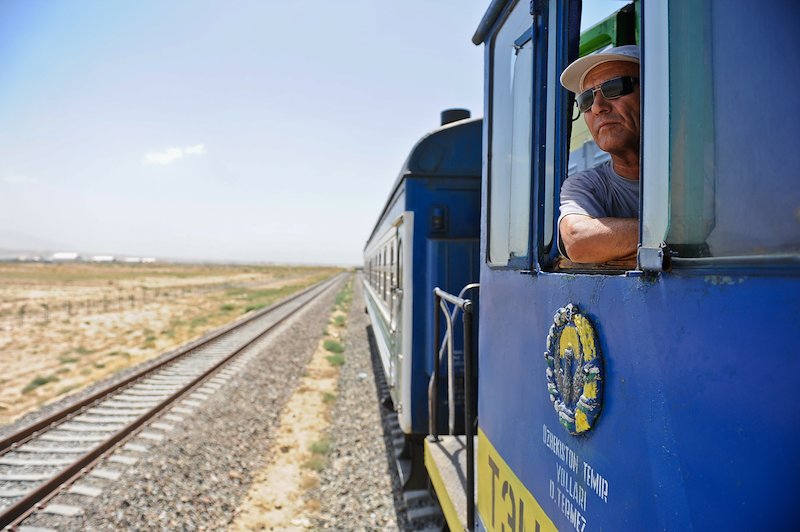 An Uzbek driver at the controls of a locomotive on the new line from Mazar-i-Sharif to Hairatan.