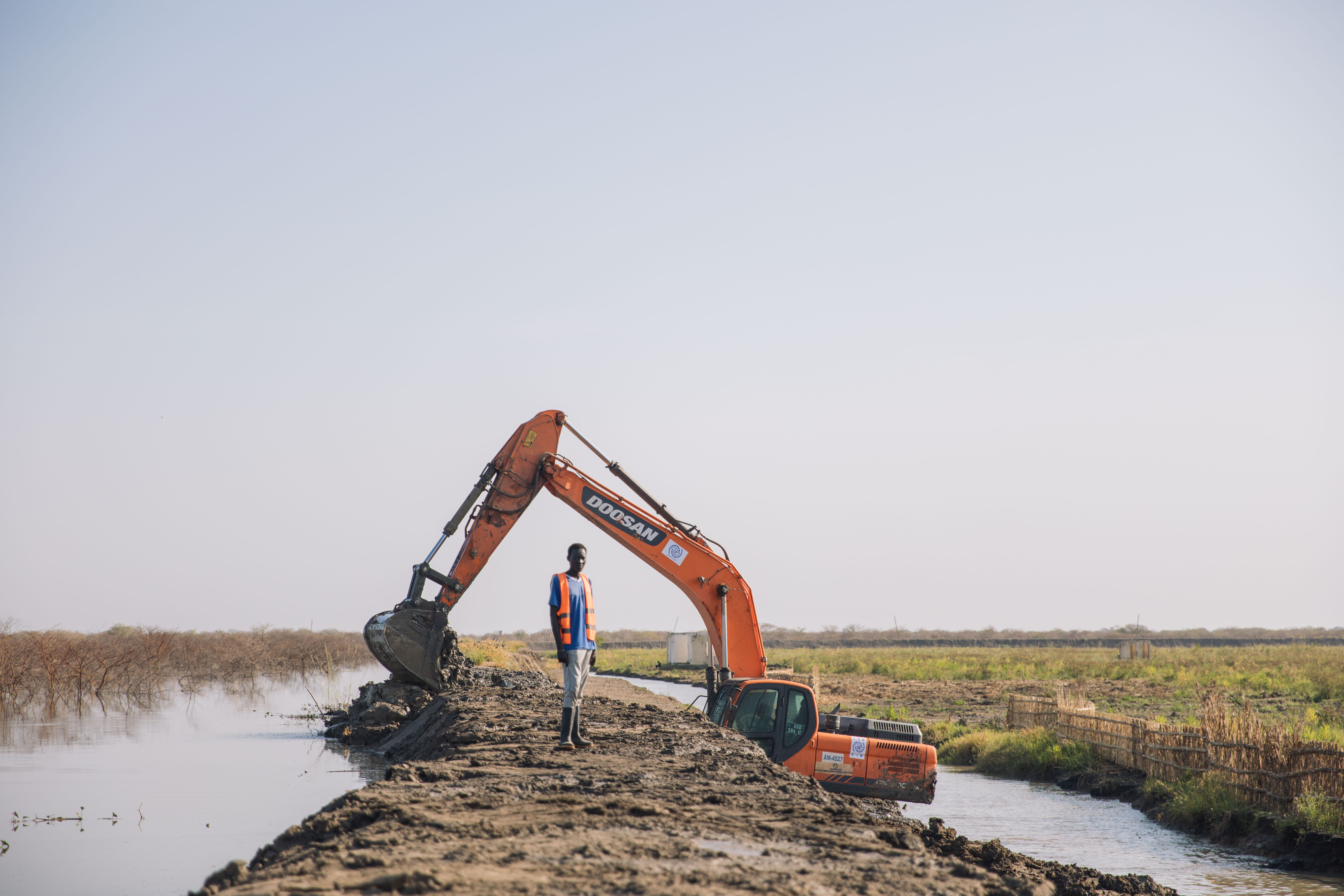 A team from the International Organization for Migration construct new ...