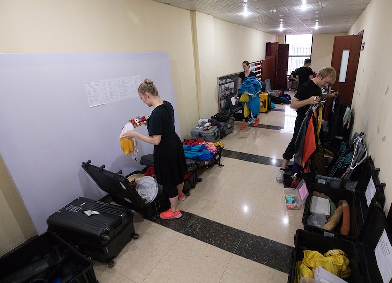 The Folk Dancers prepare their costumes for a performance. Photo by Jaren Wilkey/BYU