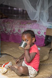 Fabiola uses her new cup from Samaritan's Purse.