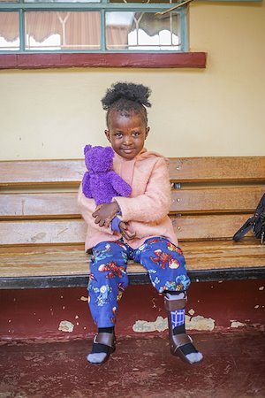 Elvin came to receive her Ankle Foot Orthosis to help her walk.