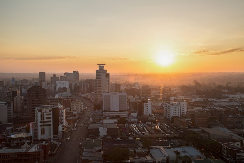 The sun rises over Zimbabwe’s capital city, Harare.