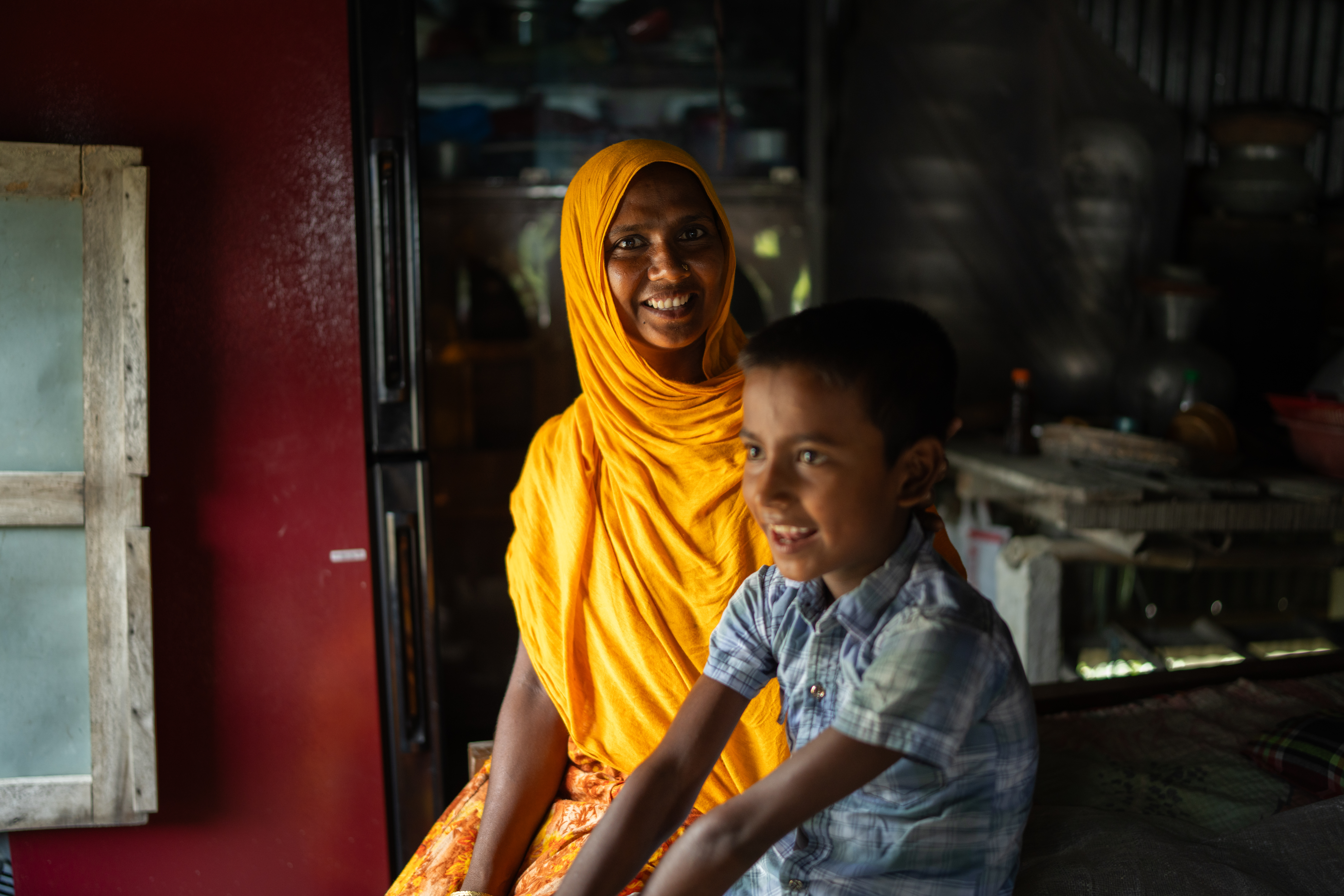 Salma Khatun and her son Meraj Sheikh. Photo: WFP/ Mehedi Rahman